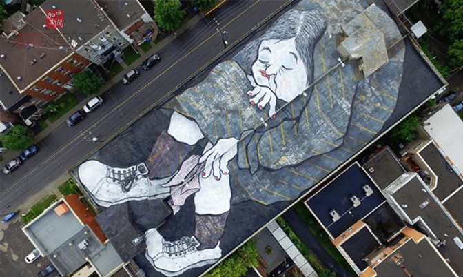 法国两壁画家在加拿大蒙特利尔楼顶留下“巨作”